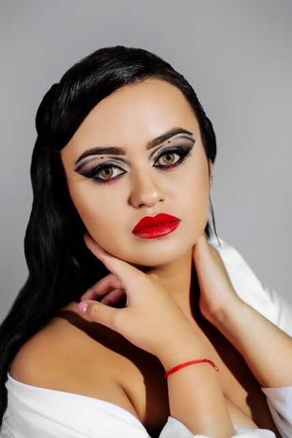 Classic glamour makeup with winged liner and a true red lip
