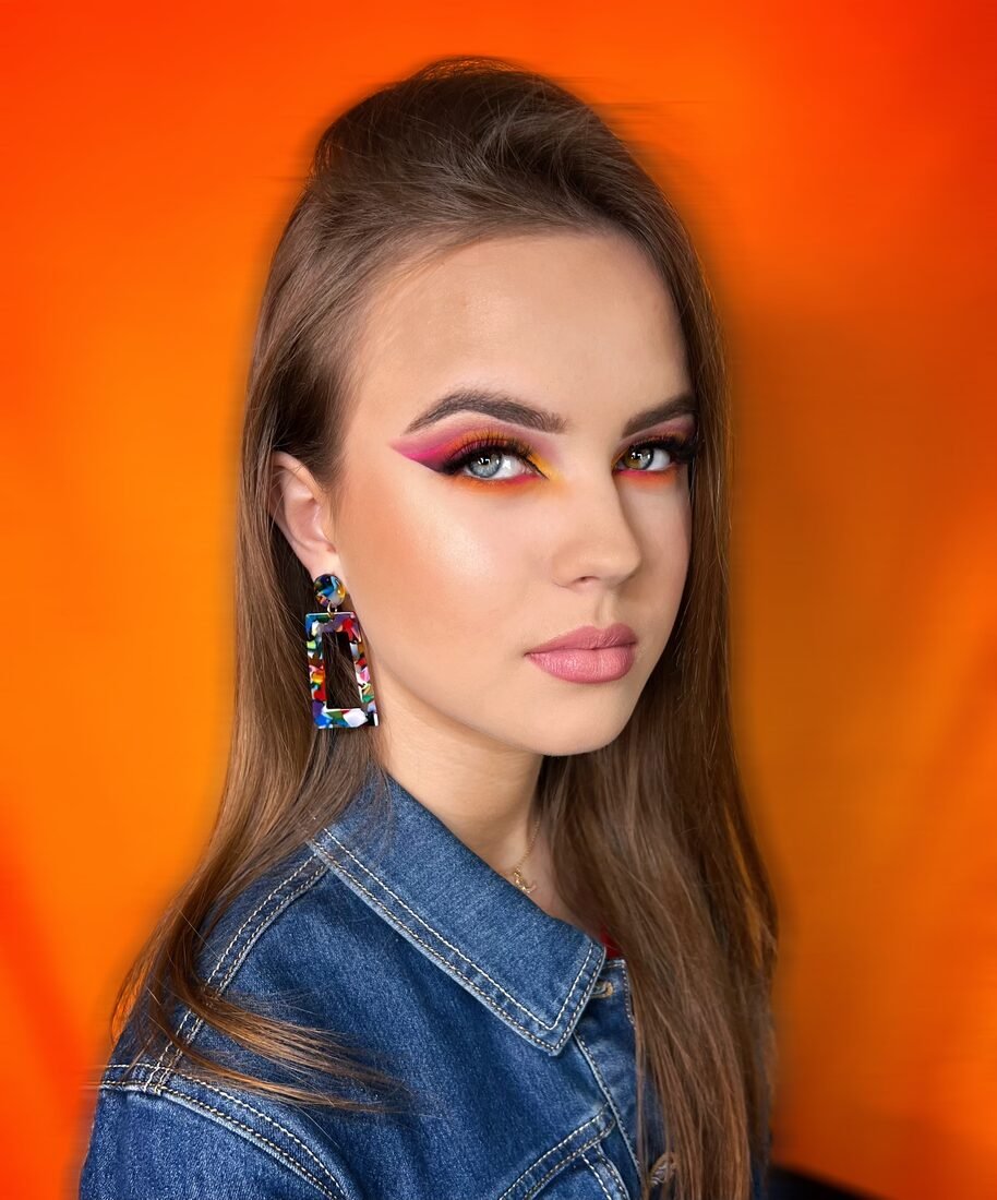 Editorial red graphic liner against an orange background